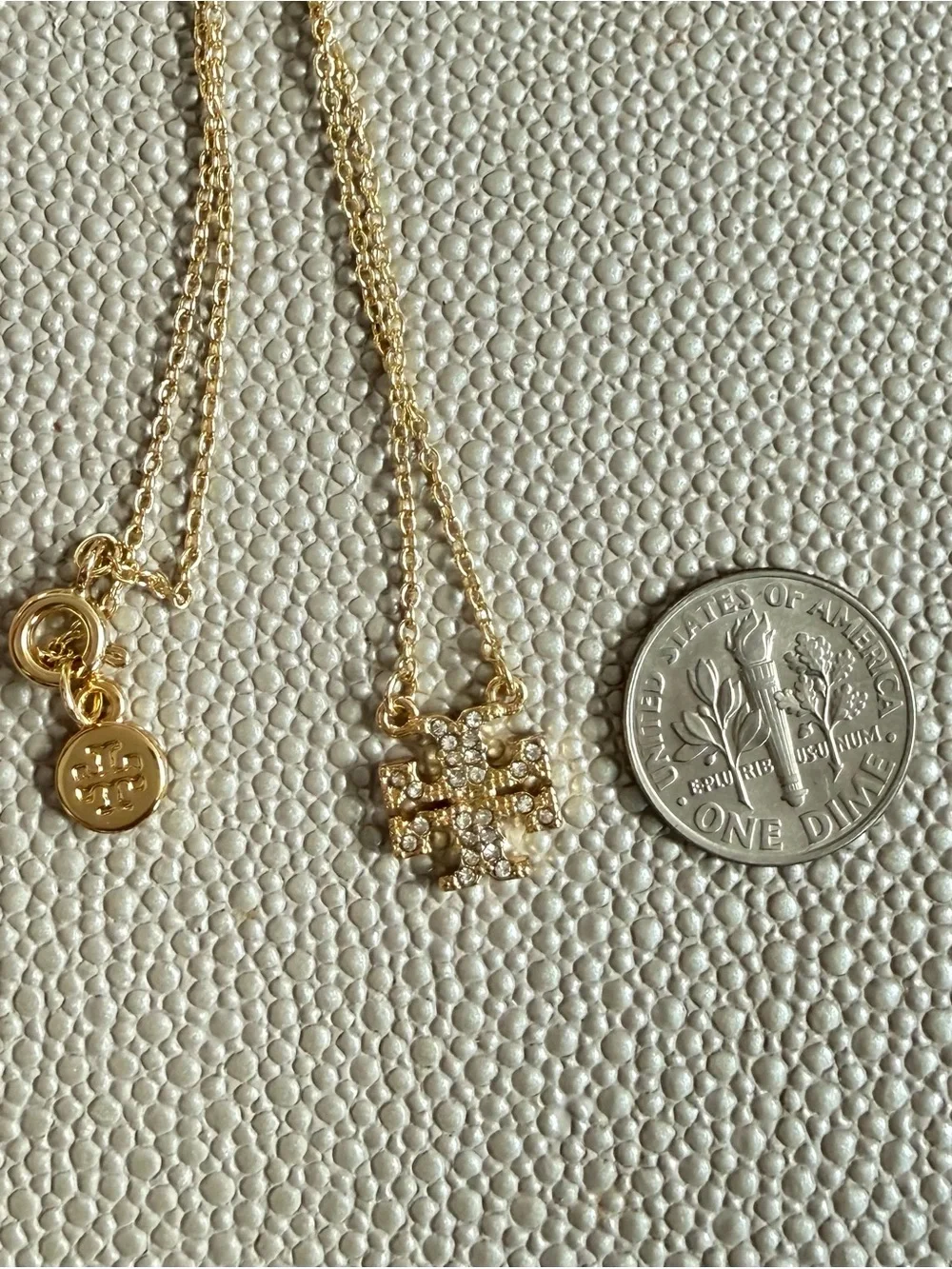 Tory Burch Gold Tone Crystal Logo Pendant Necklace